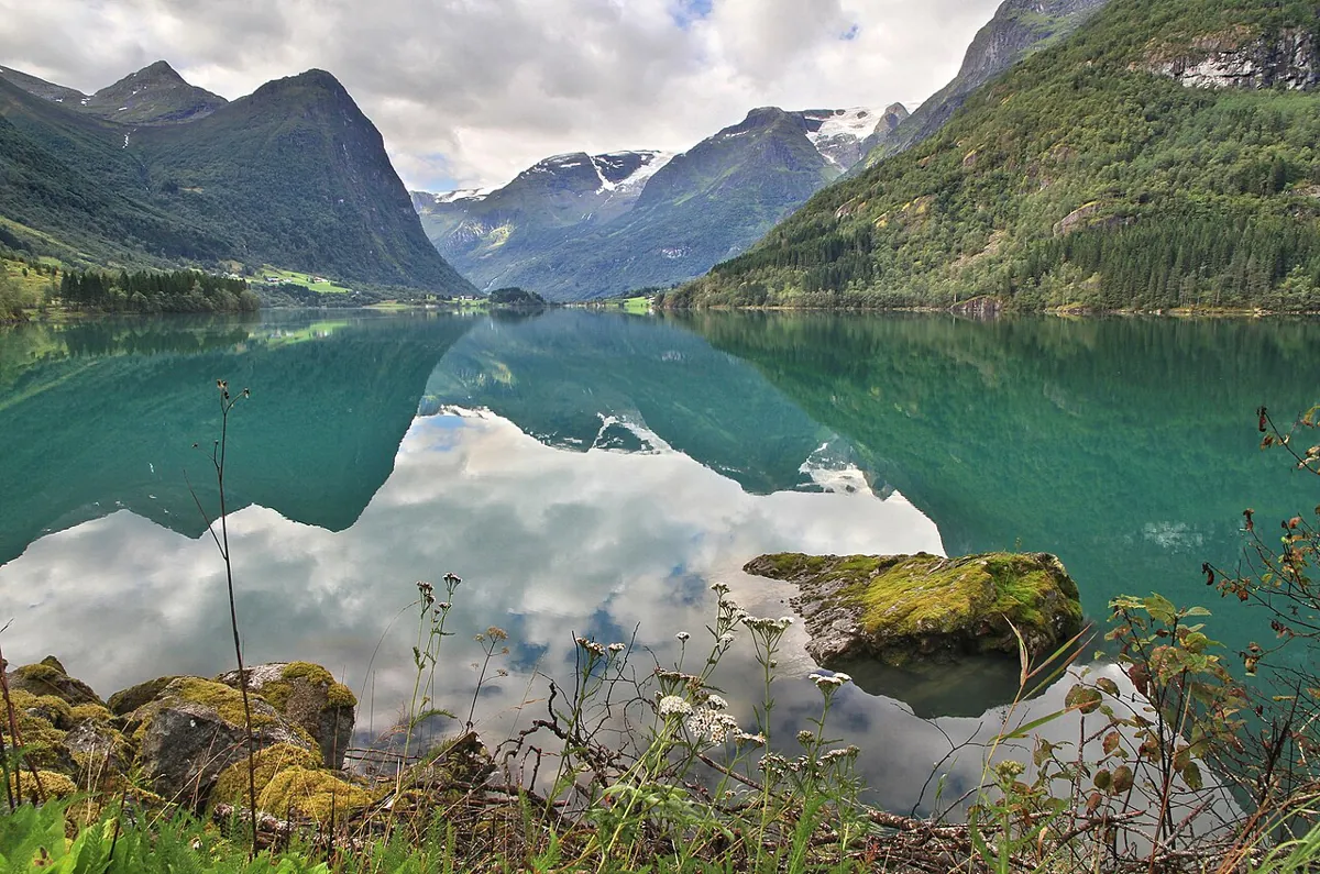 Olden lake is a typical fjord-lake and the turquoise water reveals there is a glacier nearby. — Norway